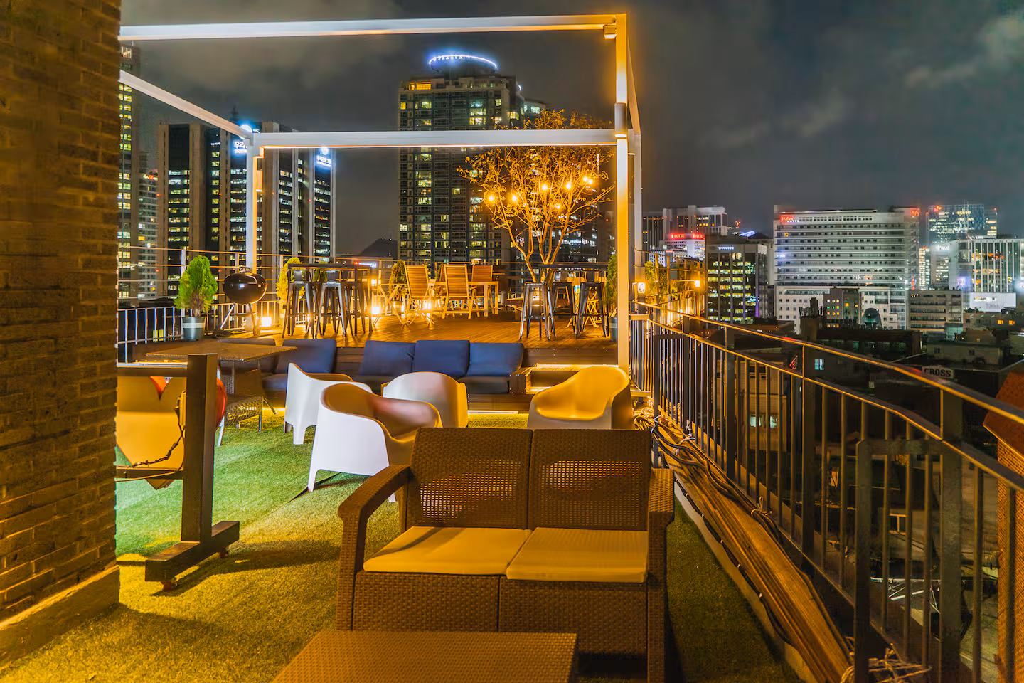 Modern luxury high-rise loft with open sky balcony view of Myeongdong